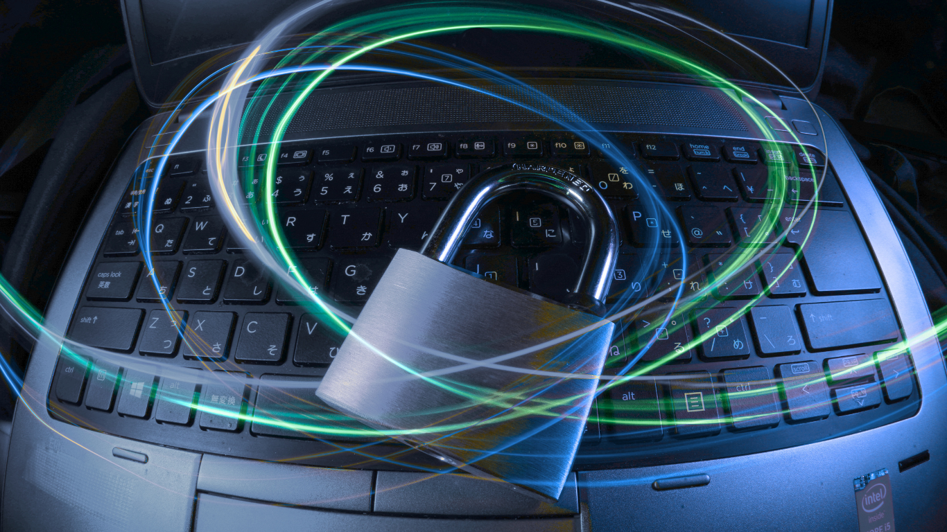 Padlock on laptop keyboard representing data protection and cyber security for UK Planning Gateway