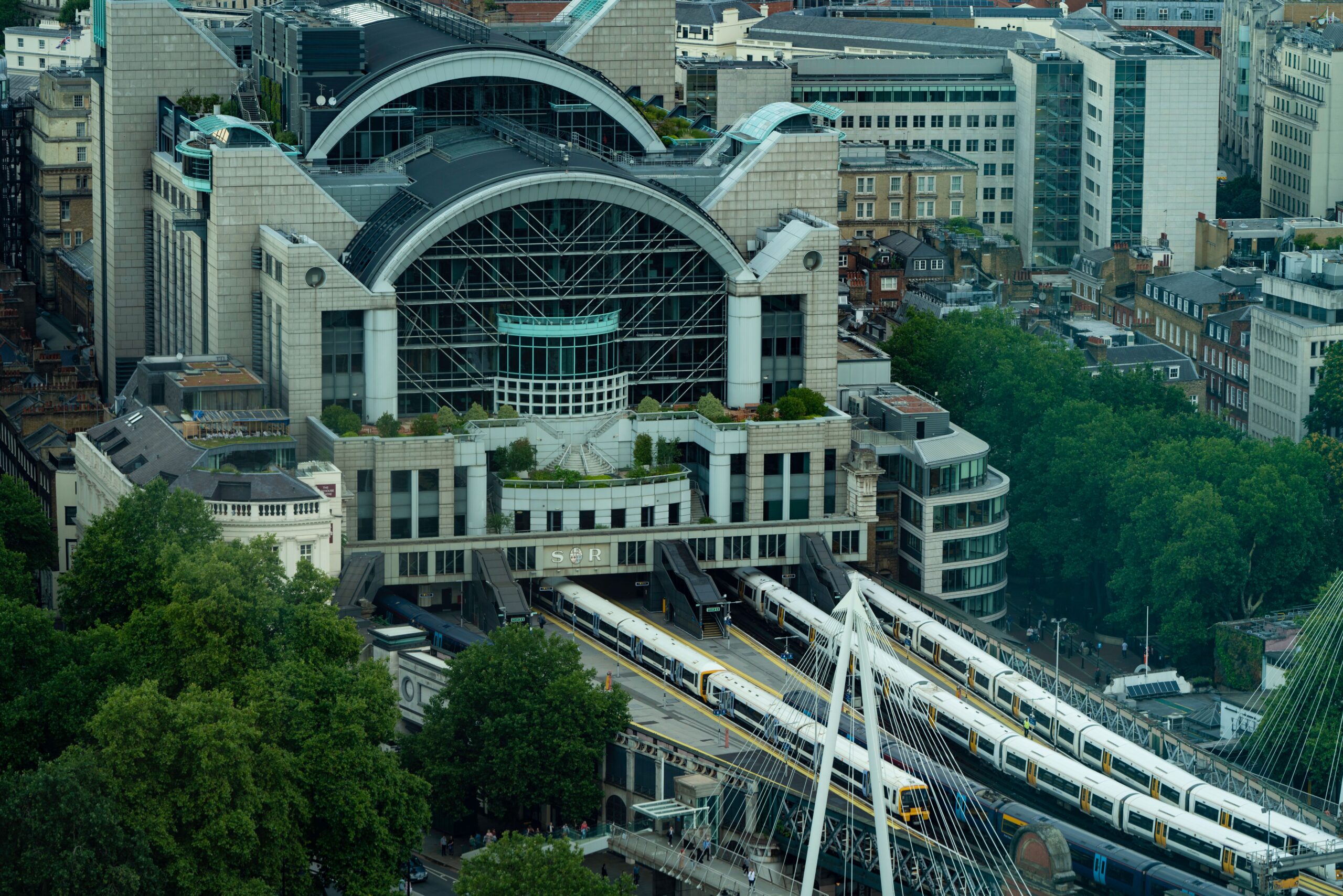 Aerial view of Charing Cross Station, railway lines and dense development in central Londo